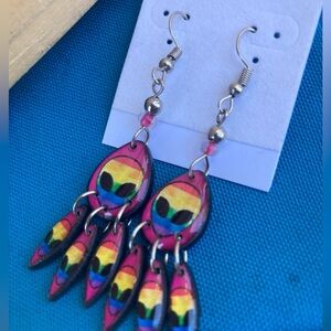 Rainbow alien earrings from Peru